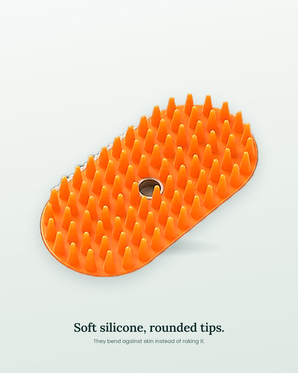 Close-up of the soft silicone bristles and the centre opening on the brush head
